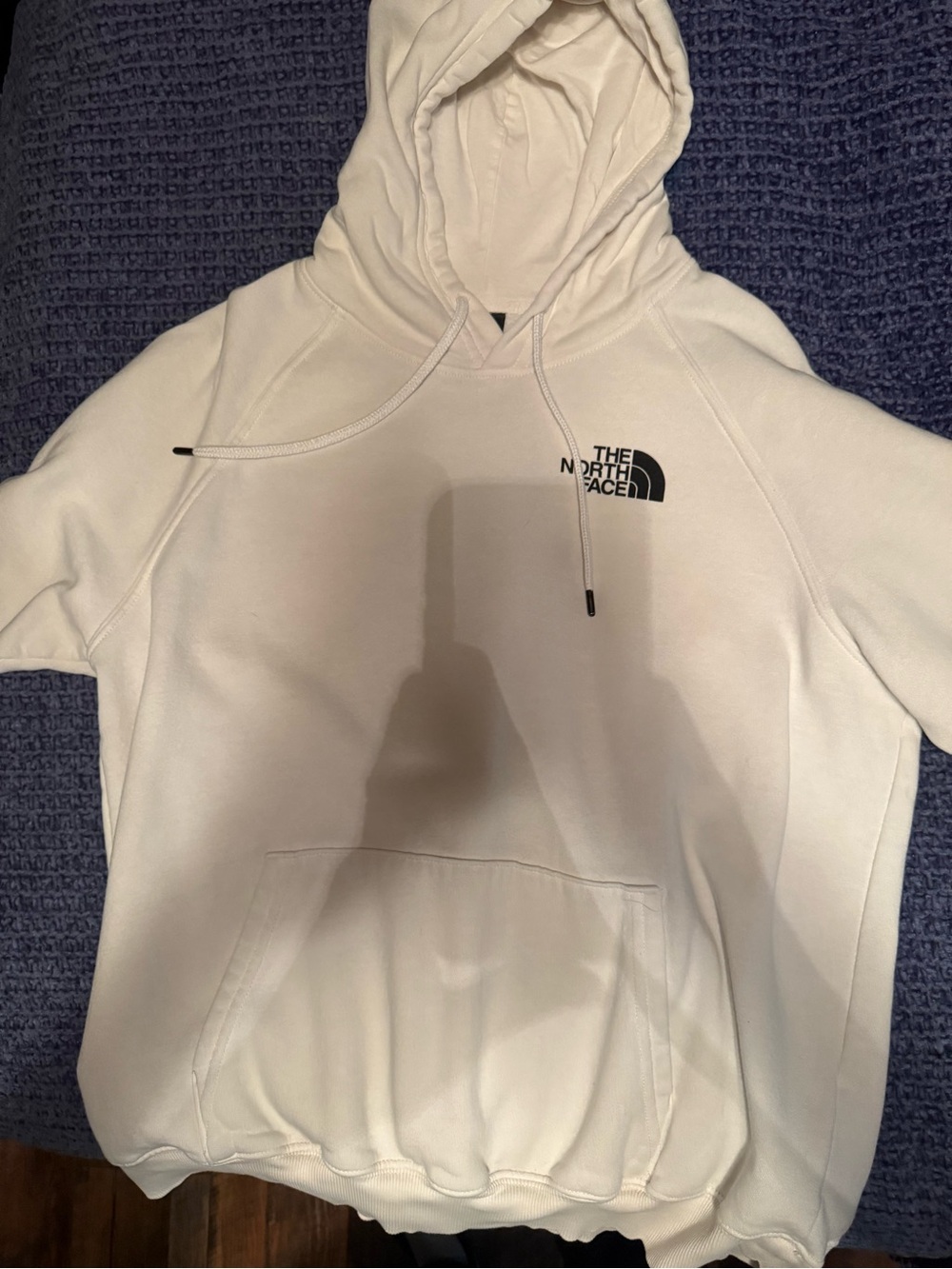 The North Face white hoodie with black logo